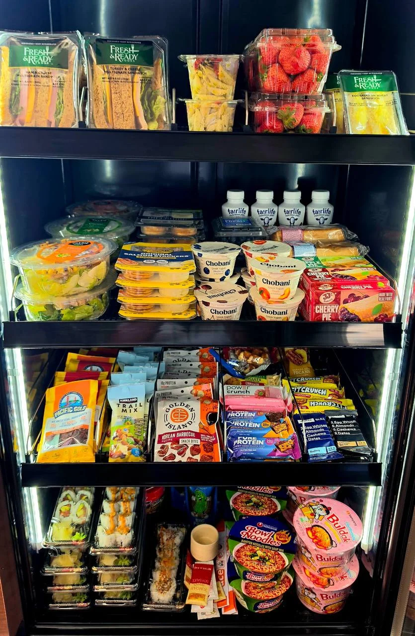 Fresh salads, strawberries, yogurt and protein inside a Smart Bites cooler